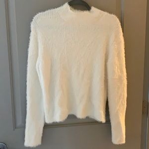 White turtleneck sweater
